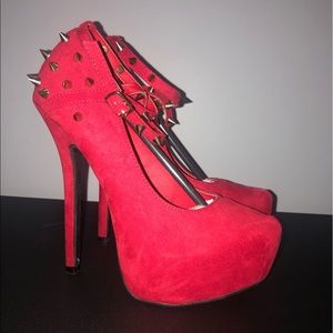 Red strappy spiked heels